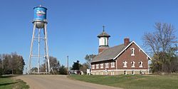 Dallas, SD, St. Augustine and water tower from S 1.JPG