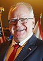 Governor Tim Walz at Commission on Judicial Selection Reception, 2023 (cropped)