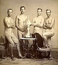 Archivo:Yale's four-oared crew team with 1876 Centennial Regatta trophy