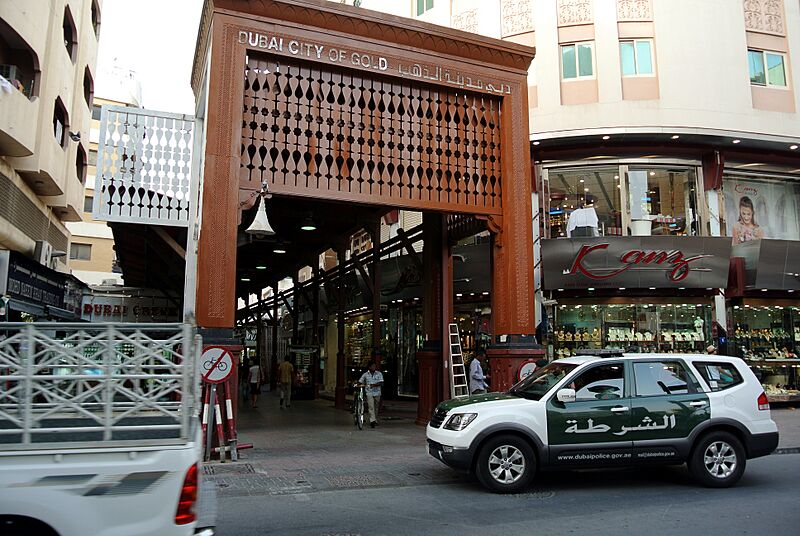 Dubai Gold Souq entrance and Dubai Police vehicle