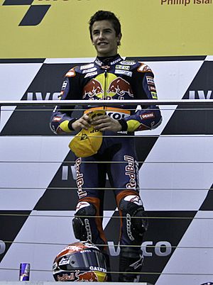 Archivo:Phillip Island 125cc podium 2010 cropped