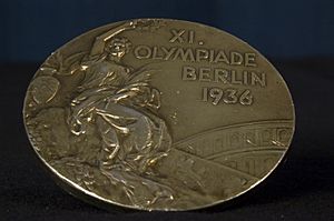 Archivo:WoodRuff 1936 Olympics medal front