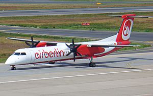 Archivo:Air Berlin DHC-8-400 (D-ABQE) taxiing at Berlin Tegel Airport