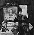 Caroline S. Brooks with a butter sculpture bas-relief of Columbus for the 1893 Columbian Exposition in Chicago