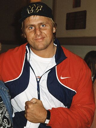 Owen Hart with a fan.jpg