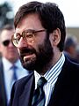 Spanish Defense Minister Narciso Serr and aides arrive at the airport for the NATO Nuclear Planning Group conference (cropped)