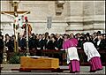 Marini venerates casket