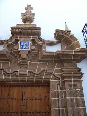 Archivo:Rota - Portada de piedra ostionera