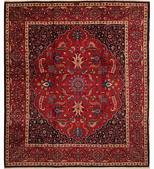 Archivo:Antique Persian Mashad rug