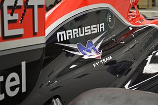 Marussia logo on one of their F1 cars (7448443504).jpg