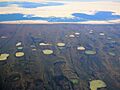 Permafrost thaw ponds in Hudson Bay Canada near Greenland (cropped)