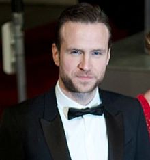Rafe Spall and wife Elize Du Toit (8464856194) (Spall cropped).jpg