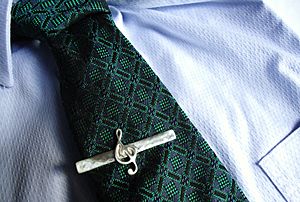 Archivo:Treble clef tie clip