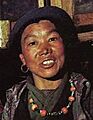 Woman with necklace made with precious coral beads detail, Sherpa (cropped)
