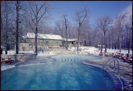 Exterior of Camp David lodge with swimming pool in foreground. - NARA - 194350.tif