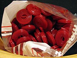 Archivo:Red Haribo licorice wheels in an open bag