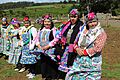 Mujeres mapuches en la entrega terreno a Comunidad Mapuche Lorenzo Quintrileo de Tirúa