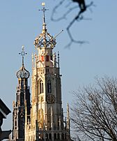 The two famous black-grey and white twin churchtowers together at Haarlem. An imposant view^ They were designed by Cornelis de Wael at 1502. He was the architect-structural engineer of the Utrecht Domtower - panoramio