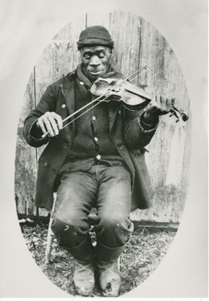 Archivo:'Joe Izzard playing the fiddle. Nova Scotia Archives