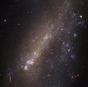 Archivo:A distorted duo IC 1727 UGC 1249
