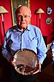 Professor Sid Watkins displays his tribute plate from the Formula One drivers of the 1985 season (6986945061)