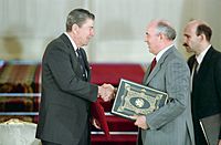 President Ronald Reagan shaking hands with Mikhail Gorbachev