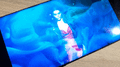 AI-generated virtual moviestar Ornella Muti, displayed on a phone screen, a detail of Joseph Ayerle's videoartwork "Un'emozione per sempre 2.0". animated GIF