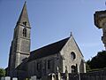 Coulombs,façade nord de l'église et portail occidental