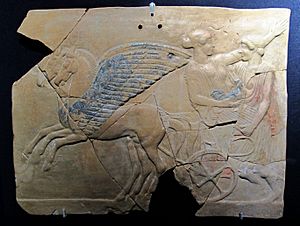 Archivo:Pinax con rapimento di persefone e cavalli alati, 460-450 ac ca., da santuario di persefone a locri epizefiri (MAN Reggio C.)