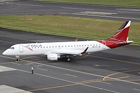 N937TA Embraer 190 TACA (7465428600).jpg