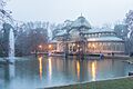 Crystal Palace in Madrid foggy evening
