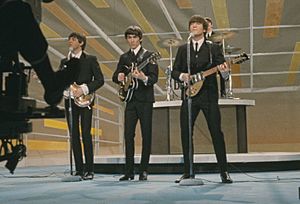 Archivo:The Beatles performing at The Ed Sullivan Show (cropped 2)