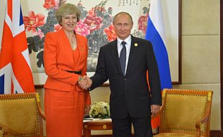 Archivo:Vladimir Putin and Theresa May (2016-09-04) 02