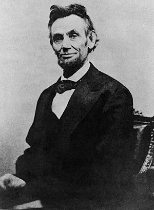 Archivo:Abraham Lincoln half length seated, April 10, 1865