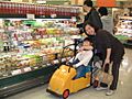 Child driveable shopping cart