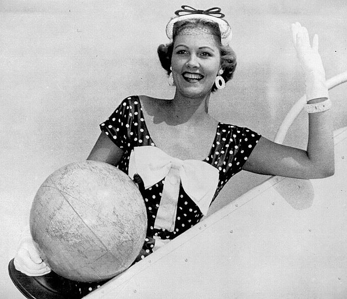 Miriam Stevenson with globe (cropped)