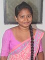 Woman with very long black braid Sri Lanka (crop waist)