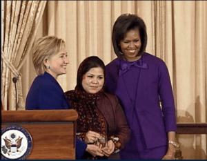 Wazhma Frogh (Afghanistan) with Secretary of State Hillary Rodham Clinton and First Lady Michelle Obama.png