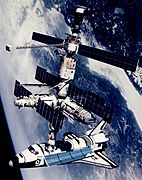 Technical rendition of STS-71 docked to Mir