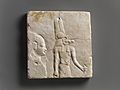 Plaque with head and shoulders of a priestly figure, opposite side head of priestly figure and most of a figure of crocodile-headed god MET DP236169