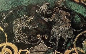 Archivo:战国金银错狩猎纹镜 河南洛阳金村