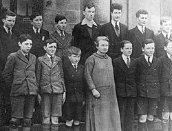 Margaret Pearse & boys of St. Enda's, ca. 1930? (35384380430).jpg