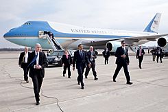 United States President Barack Obama with Senator Sherrod Brown, Representative Mary Jo Kilroy, and Secret Service personnel arriving at Port Columbus International Airport.jpg