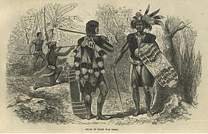 Archivo:Dayaks in their war dress