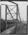 PERSPECTIVE VIEW OF BRIDGE FROM EAST END - Dresden Suspension Bridge, Spanning Muskingum River on State Route 208, Dresden, Muskingum County, OH HAER OHIO,60-DRES,1-4