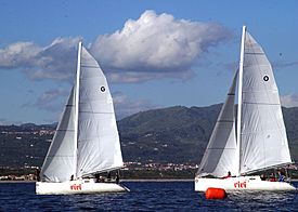 US Navy 031209-N-3503S-002 The U.S. Sailing Team jockeys for position and tries to find the best wind during the 6th race of the 3rd World Military Games sailing competition.jpg