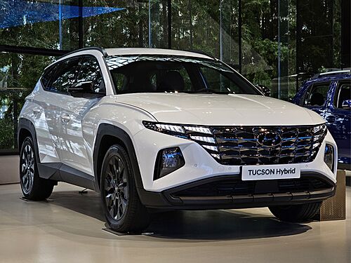 Hyundai Tucson Hybrid Adventure NX4 HEV Creamy White Pearl (2).jpg