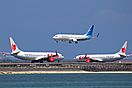 Lion Air Boeing 737s and Garuda Indonesia Boeing 737-800 at DPS.jpg