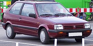 Archivo:Nissan Micra 1st series darkred vr