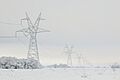 Transmission towers and lines with snow in East Texas